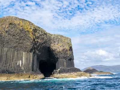 Fingal’s Cave on Staffa, a dramatic sea cave with striking hexagonal basalt columns and waves crashing at its entrance