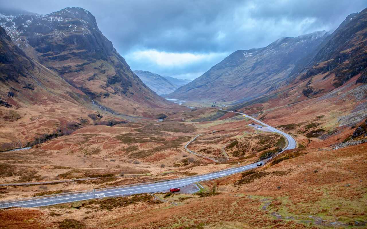 Large A82 Road Winding Along Glencoe Valley 1453829935
